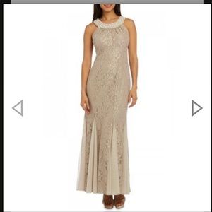 Beautiful formal dress. Pearl neckline is absolutely stunning.